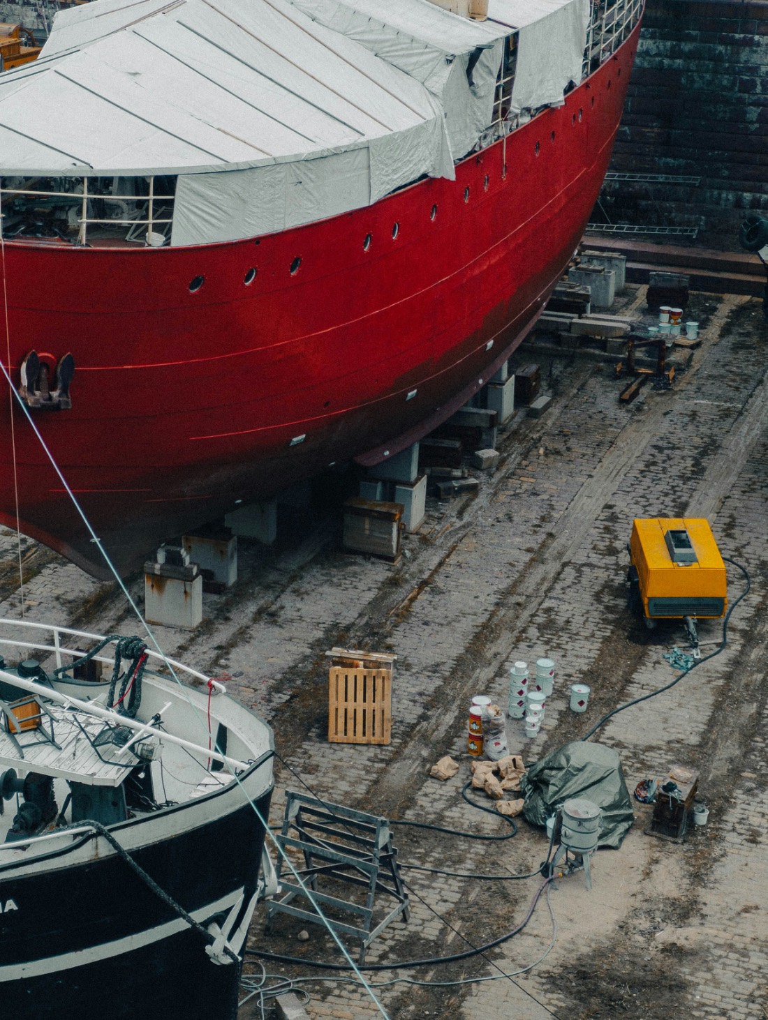 Steel-hulled vessel in dry dock